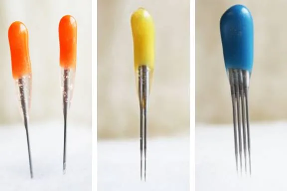 Felt Alive color-coded felting needles on the pad