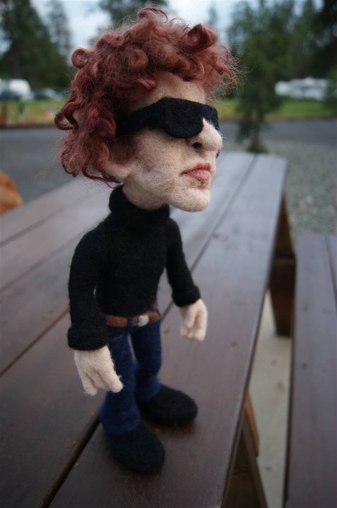 Li'l Bob Dylan showing off his needle felted profile