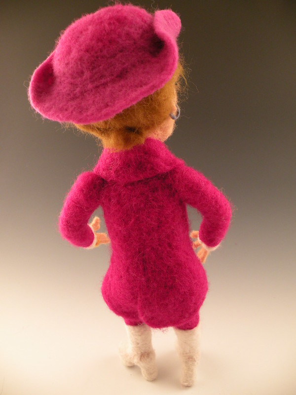 Li'l Elton looks dapper from the rear in his needle felted suit and platform boots.
