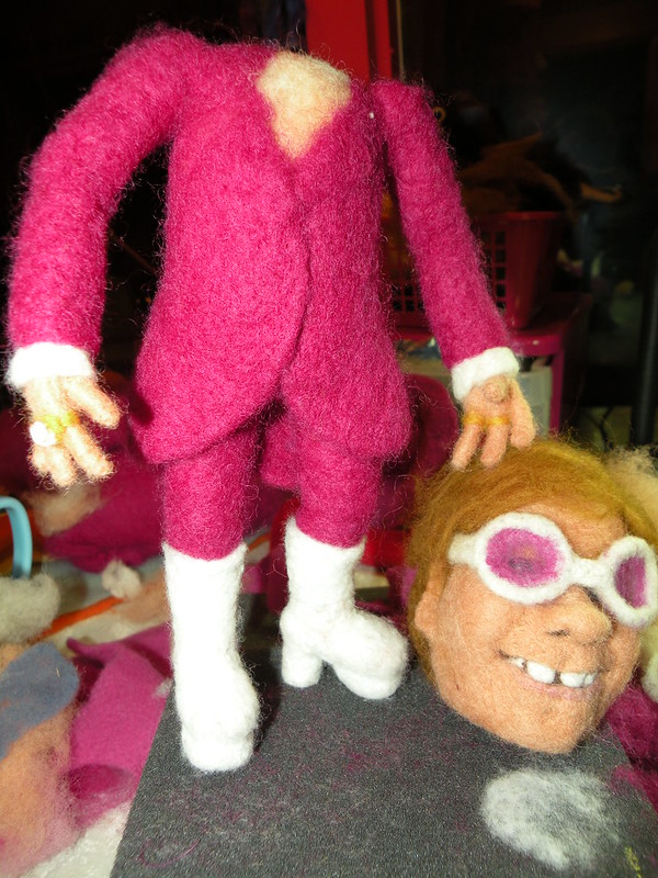 Elton John body meets Elton John head.