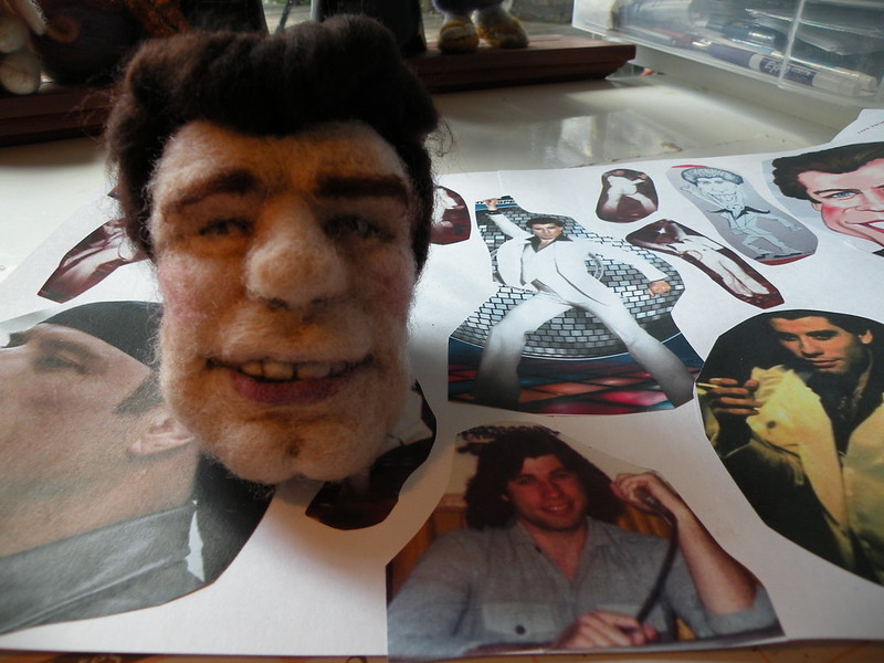 Here is li'l John Travolta coming to life in needle felted wool.