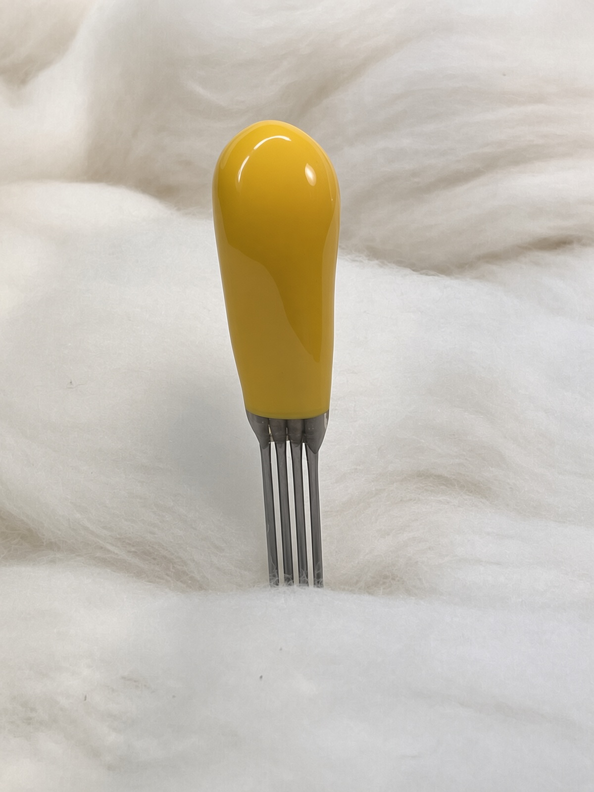 Felt Alive yellow quad felting needle with four steel points and glossy handle